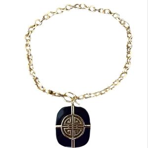 Gemma Layne statement necklace, never worn, goldtone chain w/ black/gold pendant